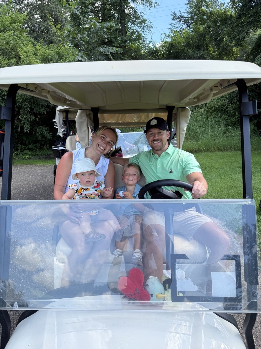 Family enjoying a round of golf